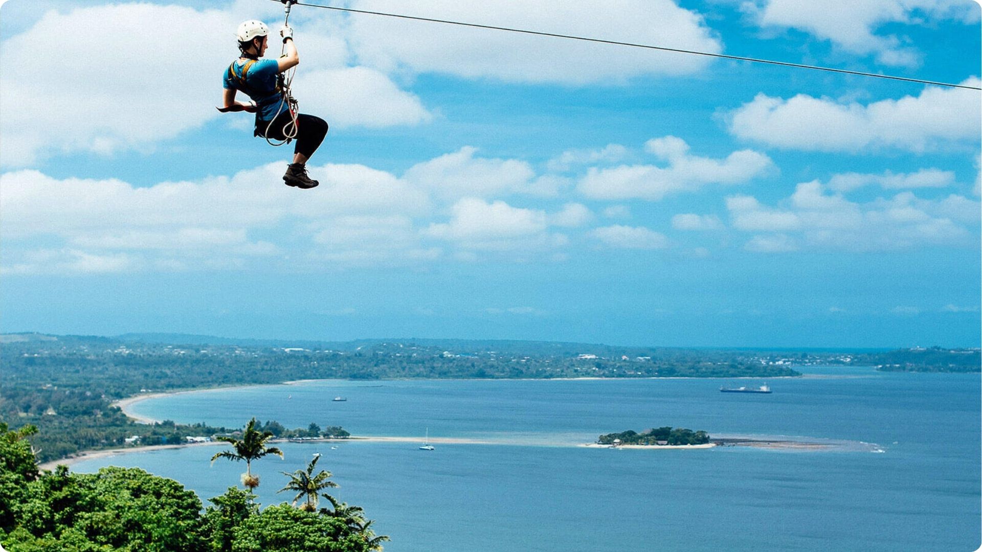 A person ziplining in Efate