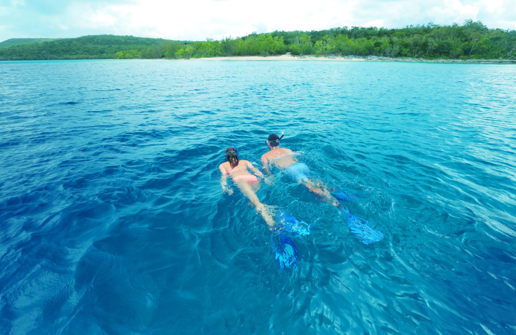Child surfing in Vanuatu